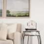 70595 - Clapp Round Light Brown W/ White Wash Wood and Silver Metal Nesting Accent Tables (Set of 2)
