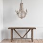 65200 - Phillum (29"x37") Silver Metal Chassis and White Wood Beaded Six Bulb Chandelier 