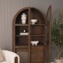 71310 - Suri Mid Brown Wood W/Glass Doors Arched Curio Cabinet